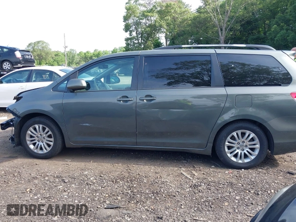 2012 Toyota Sienna XLE AAS with VIN 5TDYK3DC5CS181116, listed as a IAAI auction lot 42511625 with 120,721 mi miles and . Bid and sale history available at DreamBid. Image 13.