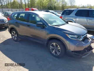2019 Honda CR-V LX with VIN 2HKRW5H32KH410676, listed as a IAAI auction lot 42038654 with 94,342 mi miles. Bid and sale history available at carsss.com. Image 1.