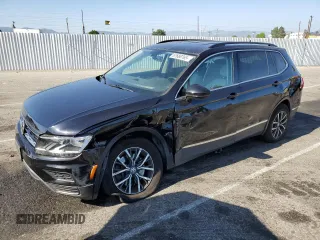 2018 Volkswagen Tiguan SEL z VIN 3VV2B7AX8JM221479, wystawiony jako Copart lot #57660765 z przebiegiem 65 278 mil mil oraz Szkoda całkowita • Salvage title. Historia ofert i sprzedaży dostępna na DreamBid. Obrazek 1.