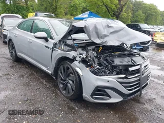 2023 Volkswagen Arteon SEL R-Line z VIN WVWAR7ANXPE010870, wystawiony jako IAAI lot #42246798 z przebiegiem 26 587 mil mil oraz . Historia ofert i sprzedaży dostępna na DreamBid. Obrazek 1.
