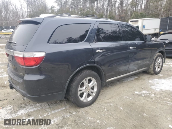 2013 Dodge Durango Crew with VIN 1C4SDJDT9DC538529, listed as a Copart auction lot 88201115 with 142,753 mi miles and Salvage title. Bid and sale history available at DreamBid. Image 3.
