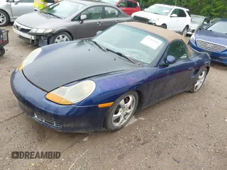2002 Porsche Boxster z VIN WP0CA29822U622397, wystawiony jako IAAI lot #42368183 z przebiegiem 189 696 mil mil oraz . Historia ofert i sprzedaży dostępna na DreamBid. Obrazek 2.