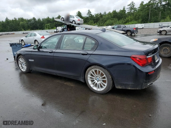 2015 BMW 7 Series 750Li xDrive with VIN WBAYF8C57FD654743, listed as a Copart auction lot 74207584 with 56,580 mi miles and Non Repairable. Bid and sale history available at carsss.com. Image 2.