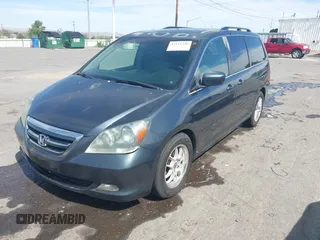 2005 Honda Odyssey TOURING with VIN 5FNRL38855B091754, listed as a IAAI auction lot 42131326 with 258,635 mi miles. Bid and sale history available at carsss.com. Image 2.