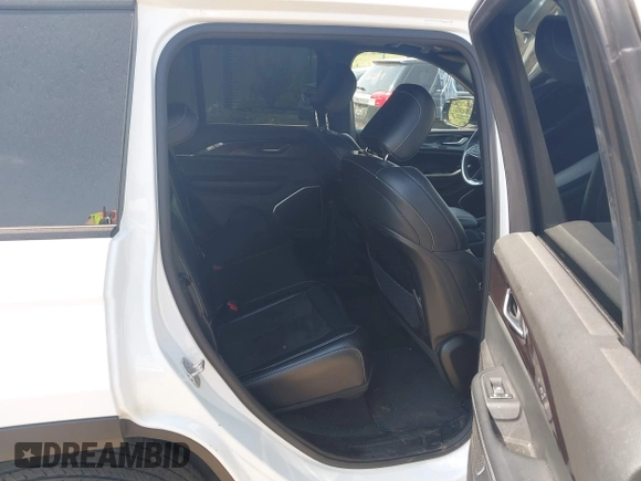 2023 Jeep Grand Cherokee Altitude with VIN 1C4RJHAG4P8106056, listed as a IAAI auction lot 42275021 with 27,251 mi miles and . Bid and sale history available at DreamBid. Image 8.
