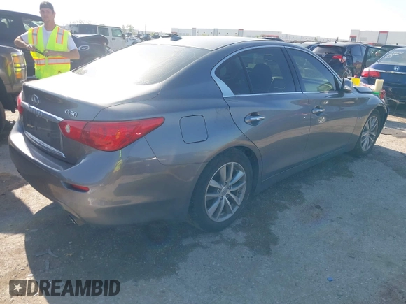 2014 Infiniti Q50 Hybrid Premium with VIN JN1AV7AP4EM691014, listed as a IAAI auction lot 41984130 with 114,230 mi miles and . Bid and sale history available at DreamBid. Image 4.