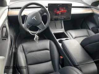 2022 Tesla Model 3 Long Range z VIN 5YJ3E1EB4NF285924, wystawiony jako Copart lot #59734055 z przebiegiem 116 680 mil mil oraz Czysty tytuł • Clean title. Historia ofert i sprzedaży dostępna na DreamBid. Obrazek 8.