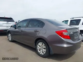 2012 Honda Civic Sdn LX with VIN 19XFB2F55CE343594, listed as a IAAI auction lot 41890065 with 119,035 mi miles. Bid and sale history available at carsss.com. Image 3.