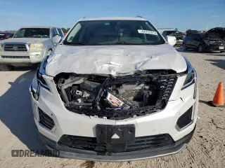 2023 Cadillac XT5 FWD Premium Luxury with VIN 1GYKNCRS7PZ150378, listed as a Copart auction lot 84757014 with 21,631 mi miles and Salvage Title. Bid and sale history available at carsss.com. Image 5.