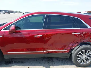 2017 Cadillac XT5 Luxury FWD z VIN 1GYKNBRS4HZ151581, wystawiony jako IAAI lot #42043322 z przebiegiem 120 598 mil mil oraz . Historia ofert i sprzedaży dostępna na DreamBid. Obrazek 14.