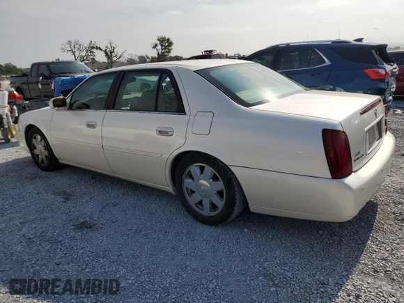 2003 Cadillac DeVille DTS z VIN 1G6KF57933U147843, wystawiony jako Copart lot #55875195 z przebiegiem 160 814 mil mil oraz Szkody całkowita. Historia ofert i sprzedaży dostępna na DreamBid. Obrazek 2.