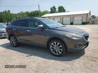 2015 Mazda CX-9 Grand Touring with VIN JM3TB2DA9F0468539, listed as a Copart auction lot 60829905 with 223,483 mi miles and Clean title. Bid and sale history available at DreamBid. Image 4.