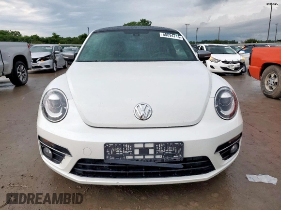 2014 Volkswagen Beetle 1.8T z VIN 3VWJ17AT5EM652990, wystawiony jako Copart lot #60094715 z przebiegiem 109 911 mil mil oraz Szkoda całkowita • Salvage title. Historia ofert i sprzedaży dostępna na DreamBid. Obrazek 5.