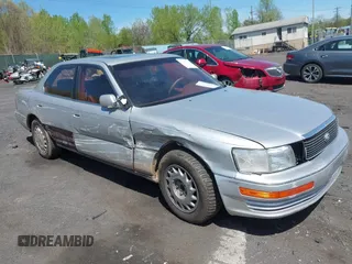 1990 Lexus LS z VIN JT8UF11E7L0009779, wystawiony jako IAAI lot #42161144 z przebiegiem 180 032 mil mil oraz . Historia ofert i sprzedaży dostępna na DreamBid. Obrazek 1.
