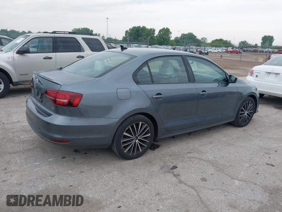 2016 Volkswagen Jetta Sport z VIN 3VWD17AJ8GM292211, wystawiony jako IAAI lot #42371317 z przebiegiem 142 360 mil mil oraz . Historia ofert i sprzedaży dostępna na DreamBid. Obrazek 4.