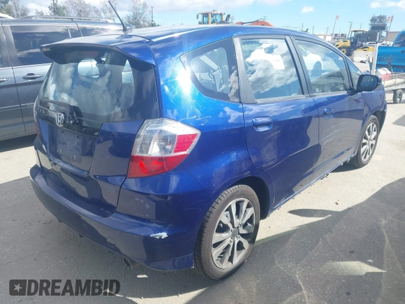 2013 Honda Fit Sport with VIN JHMGE8H50DC052326, listed as a IAAI auction lot 41798913 with 140,894 mi miles. Bid and sale history available at carsss.com. Image 4.