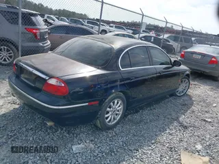 2005 Jaguar S-Type with VIN SAJWA01T15FN16454, listed as a IAAI auction lot 41650066 with 104,942 mi miles and . Bid and sale history available at DreamBid. Image 4.