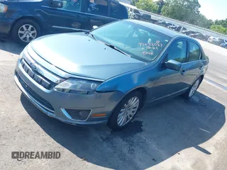 2011 Ford Fusion Hybrid with VIN 3FADP0L3XBR217504, listed as a IAAI auction lot 42633083 with 166,274 mi miles and . Bid and sale history available at DreamBid. Image 2.
