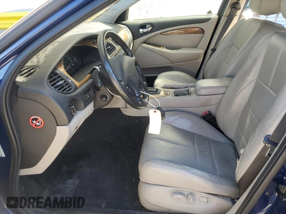 2002 Jaguar S-Type with VIN SAJDA03N32FM35859, listed as a Copart auction lot 48089525 with 67,675 mi miles and Clean Title. Bid and sale history available at DreamBid. Image 7.