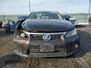 2013 Lexus CT 200h z VIN JTHKD5BH7D2125213, wystawiony jako Copart lot #49122645 z przebiegiem 166 743 mil mil oraz Szkody całkowita. Historia ofert i sprzedaży dostępna na DreamBid. Obrazek 5.
