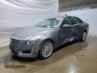 2017 Cadillac CTS Luxury AWD with VIN 1G6AX5SX2H0159995, listed as a Copart auction lot 52853995 with 64,641 mi miles and Salvage title. Bid and sale history available at DreamBid. Image 1.