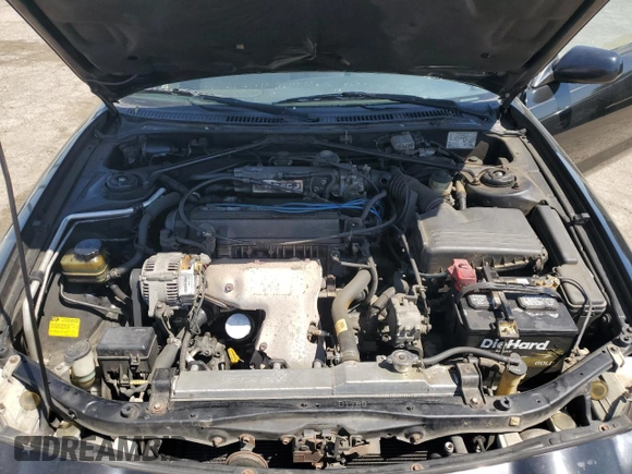 1997 Toyota Celica GT z VIN JT5FG02TXV0044202, wystawiony jako Copart lot #52166575 z przebiegiem 167 292 mil mil oraz Szkoda całkowita • Salvage title. Historia ofert i sprzedaży dostępna na DreamBid. Obrazek 11.