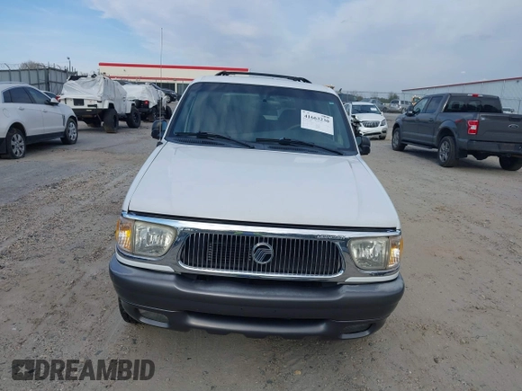 2000 Mercury Mountaineer z VIN 4M2ZU66P9YUJ19036, wystawiony jako IAAI lot #41663230 z przebiegiem 159 635 mil mil oraz . Historia ofert i sprzedaży dostępna na DreamBid. Obrazek 6.