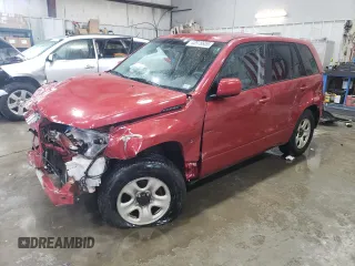 2011 Suzuki Grand Vitara Premium z VIN JS3TD0D25B4102081, wystawiony jako Copart lot #43978955 z przebiegiem 310 535 mil mil oraz Szkoda całkowita • Salvage title. Historia ofert i sprzedaży dostępna na DreamBid. Obrazek 1.
