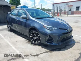 2017 Toyota Corolla L z VIN 5YFBURHE6HP604588, wystawiony jako IAAI lot #42247385 z przebiegiem 73 463 mil mil oraz . Historia ofert i sprzedaży dostępna na DreamBid. Obrazek 1.