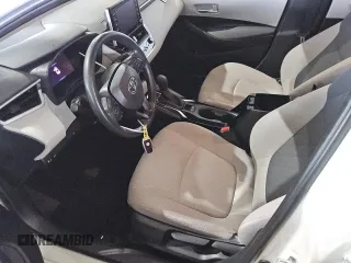2021 Toyota Corolla Hybrid LE with VIN JTDEAMDE5MJ012774, listed as a Copart auction lot 46586165 with 49,310 mi miles and Salvage Title. Bid and sale history available at carsss.com. Image 7.