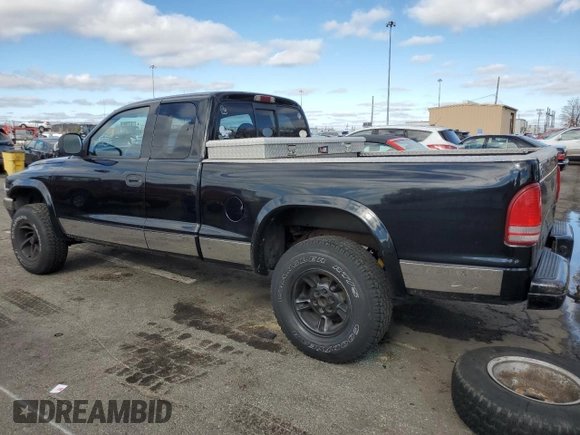 1999 Dodge Dakota SLT with VIN 1B7GG22Y5XS107729, listed as a Copart auction lot 79440034 with 163,718 mi miles and Salvage Title. Bid and sale history available at DreamBid. Image 2.