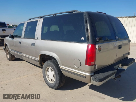 1999 Chevrolet Suburban with VIN 3GNEC16RXXG111175, listed as a IAAI auction lot 41193569 with 276,326 mi miles and . Bid and sale history available at DreamBid. Image 3.