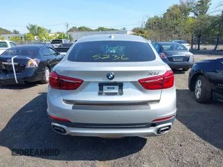2018 BMW X6 xDrive35i z VIN 5UXKU2C51J0X50507, wystawiony jako IAAI lot #40275236 z przebiegiem 67 523 mil mil oraz . Historia ofert i sprzedaży dostępna na DreamBid. Obrazek 16.