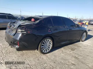 2024 BMW i5 eDrive40 with VIN WBY33FK03RCR92861, listed as a Copart auction lot 88443755 with 13,138 mi miles and Salvage title. Bid and sale history available at DreamBid. Image 3.