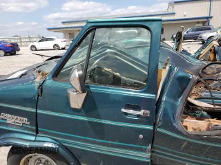 1995 Chevrolet Chevy Van z VIN 1GBEG25K7SF103122, wystawiony jako Copart lot #68112704 z przebiegiem Nie podano mil oraz Szkody całkowita. Historia ofert i sprzedaży dostępna na DreamBid. Obrazek 9.