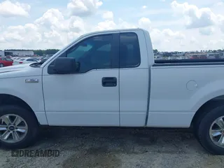2007 Ford F-150 XL z VIN 1FTRF12W07NA59933, wystawiony jako IAAI lot #42491520 z przebiegiem Nie podano mil oraz . Historia ofert i sprzedaży dostępna na DreamBid. Obrazek 14.
