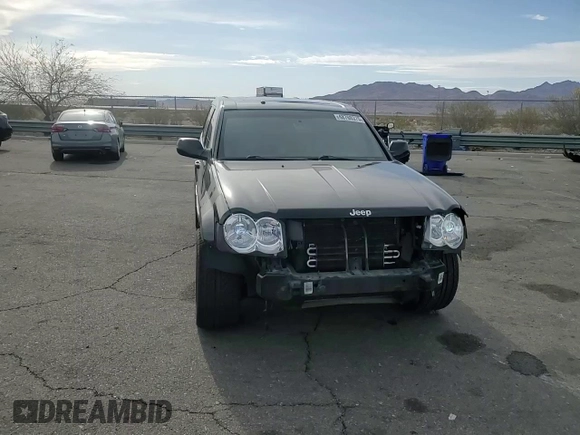 2008 Jeep Grand Cherokee SRT-8 with VIN 1J8HR78398C214004, listed as a Copart auction lot 48760375 with 165,318 mi miles and Salvage Title. Bid and sale history available at carsss.com. Image 12.