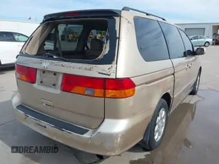 2002 Honda Odyssey EX-L z VIN 2HKRL18042H567858, wystawiony jako IAAI lot #41686147 z przebiegiem 264 570 mil mil oraz . Historia ofert i sprzedaży dostępna na DreamBid. Obrazek 6.