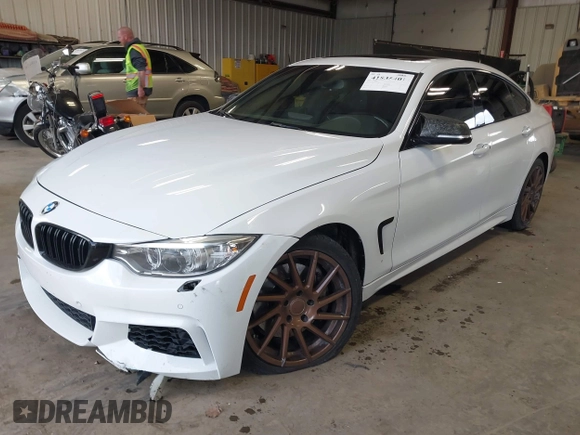 2015 BMW 4 Series 435i xDrive z VIN WBA4B3C53FD669771, wystawiony jako IAAI lot #41835401 z przebiegiem 145 570 mil mil oraz . Historia ofert i sprzedaży dostępna na DreamBid. Obrazek 17.