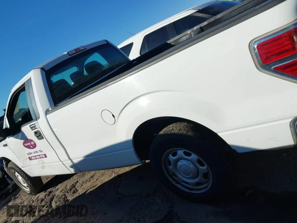 2013 Ford F-150 XL with VIN 1FTNF1CFXDKE78575, listed as a IAAI auction lot 41293852 with 201,332 mi miles. Bid and sale history available at carsss.com. Image 14.