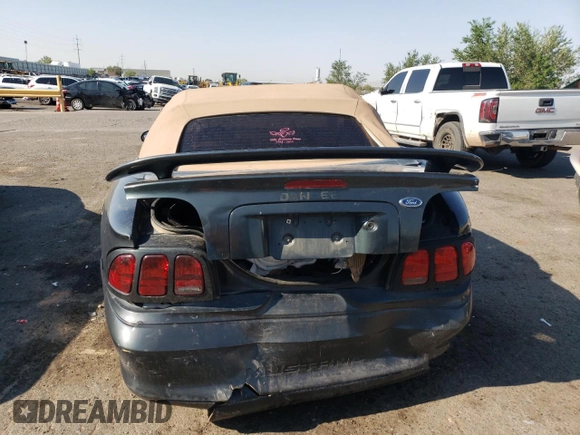1998 Ford Mustang with VIN 1FAFP444XWF176396, listed as a Copart auction lot 61322984 with 86,168 mi miles and Salvage title. Bid and sale history available at DreamBid. Image 6.