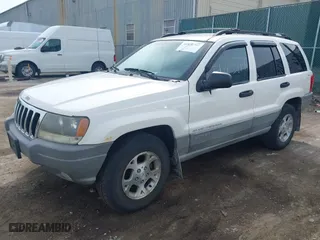 1999 Jeep Grand Cherokee Laredo with VIN 1J4GW58SXXC623404, listed as a IAAI auction lot 41838797 with 0 mi miles. Bid and sale history available at carsss.com. Image 2.