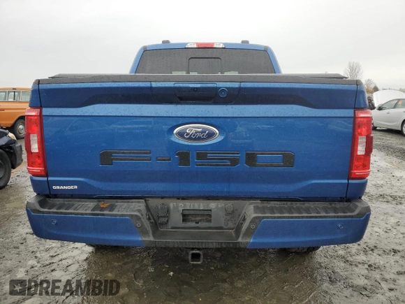 2022 Ford F-150 XL with VIN 1FTFW1E57NKD84700, listed as a Copart auction lot 84911824 with 30,300 mi miles and Salvage Title. Bid and sale history available at carsss.com. Image 6.
