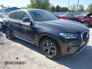 2022 BMW X4 xDrive30i z VIN 5UX33DT01N9M86651, wystawiony jako IAAI lot #42234373 z przebiegiem 51 752 mil mil oraz . Historia ofert i sprzedaży dostępna na DreamBid. Obrazek 1.