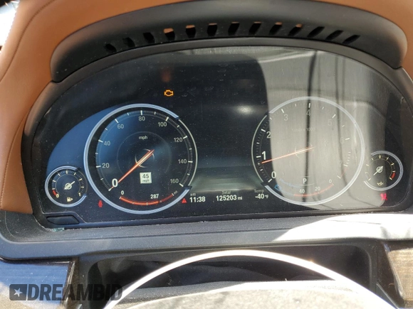 2015 BMW 7 Series 750Li with VIN WBAYE8C59FD781223, listed as a Copart auction lot 54944265 with 125,203 mi miles and Salvage title. Bid and sale history available at DreamBid. Image 9.