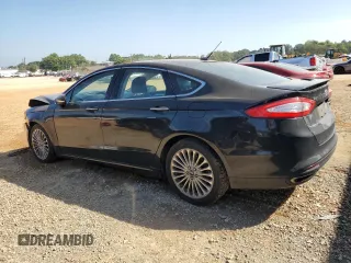 2016 Ford Fusion Titanium z VIN 3FA6P0K98GR151640, wystawiony jako Copart lot #73254594 z przebiegiem 145 473 mil mil oraz Szkoda całkowita • Salvage title. Historia ofert i sprzedaży dostępna na DreamBid. Obrazek 2.