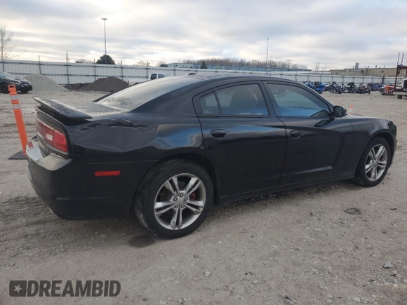 2012 Dodge Charger SXT with VIN 2C3CDXJG1CH240409, listed as a Copart auction lot 81831584 with 185,527 mi miles and Clean Title. Bid and sale history available at carsss.com. Image 3.
