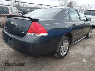 2013 Chevrolet Impala LT with VIN 2G1WB5E30D1110926, listed as a IAAI auction lot 41964457 with 106,064 mi miles and . Bid and sale history available at DreamBid. Image 4.