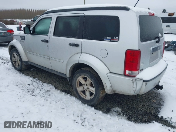 2007 Dodge Nitro SLT with VIN 1D8GU58K07W734541, listed as a IAAI auction lot 41556413 with 221,119 mi miles. Bid and sale history available at carsss.com. Image 3.