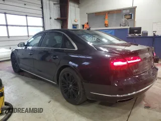 2015 Audi A8 L 4.0T with VIN WAU32AFD3FN036507, listed as a Copart auction lot 82298094 with 77,156 mi miles and Salvage Title. Bid and sale history available at carsss.com. Image 2.